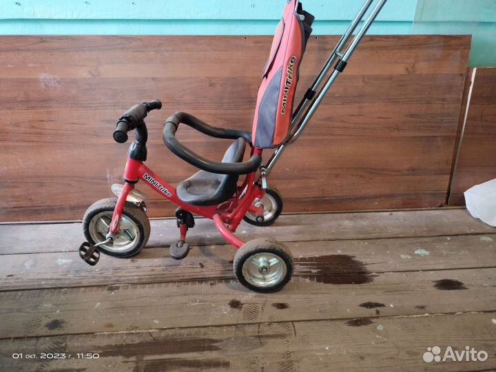 Трехколесный велосипед с ручкой