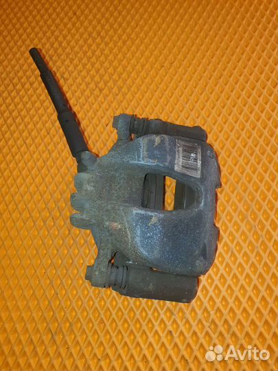 Суппорт тормозной передний левый Peugeot 308