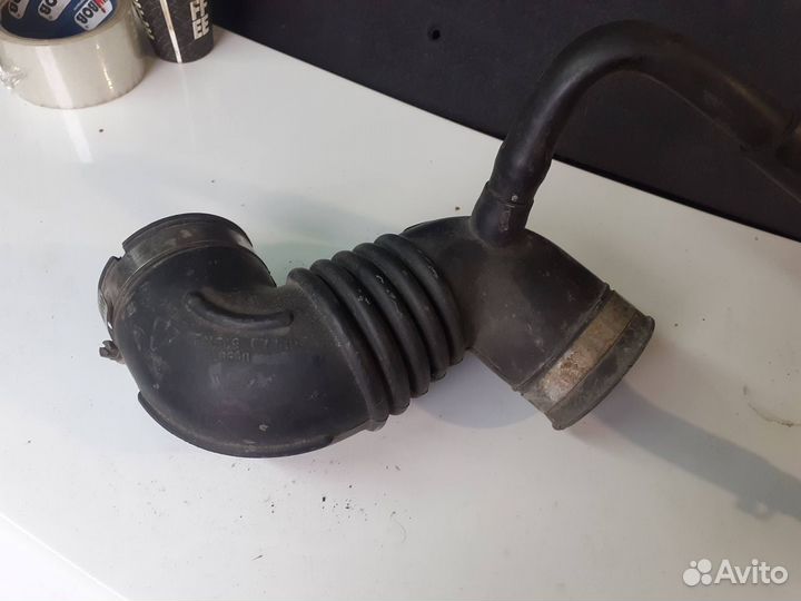 Патрубок фильтра Geely Emgrand EC7