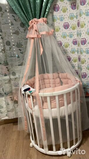 Детская кроватка с маятником круглая