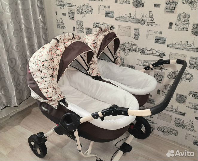 Детская коляска для двойняшек