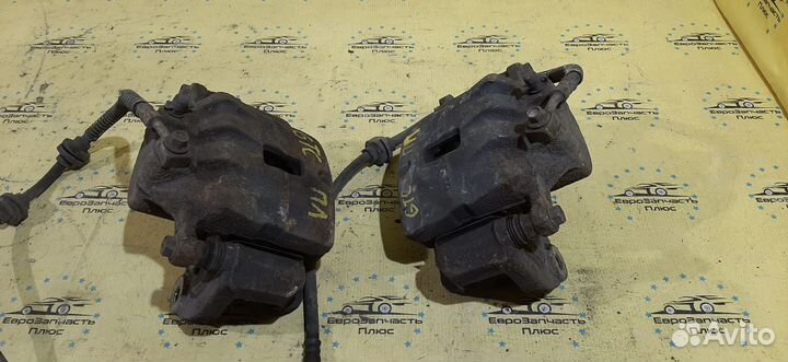 Суппорт тормозов передний Opel Astra J GTC