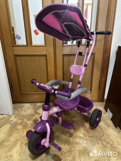 Трехколесный велосипед с ручкой