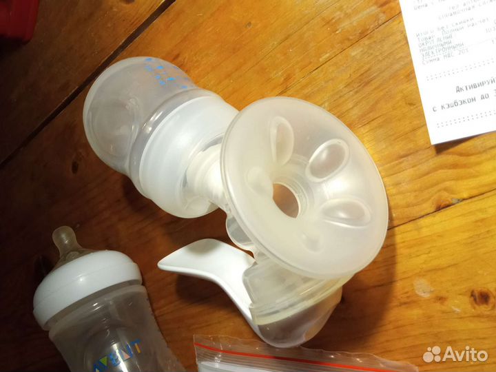 Молокоотсос avent ручной и бутылочка для корм- я