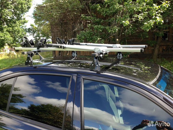 Велокрепление на крышу авто с противооткатами Амос