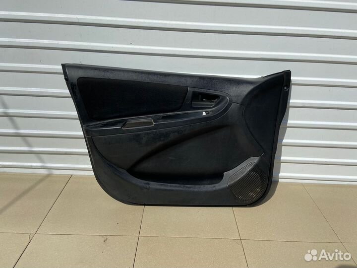 Обшивка двери передняя левая Geely мк