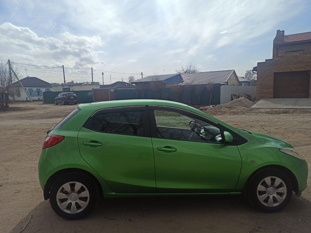 Mazda Demio: фото владельца