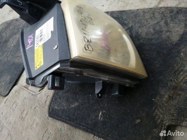 Фара передняя левая Nissan Cube Z11