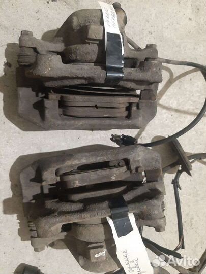 Суппорт передний Mercedes-Benz W124