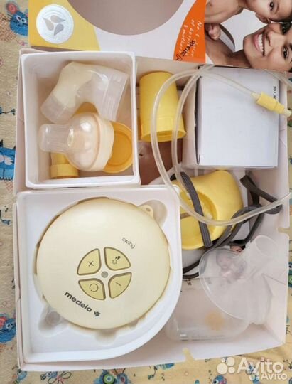 Молокоотсос medela электрический