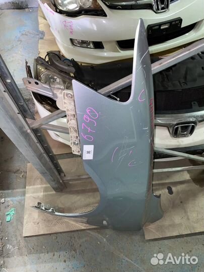 Крыло левое переднее Mitsubishi lancer 10