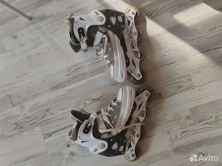 Роликовые коньки