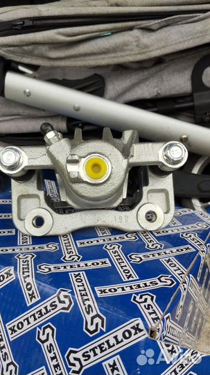 Суппорт тормозной задний Kia Sportage 2 4wd