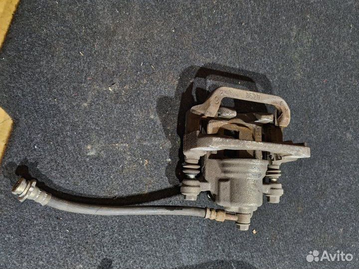 Суппорт тормозной задний правый Nissan X-Trail T31