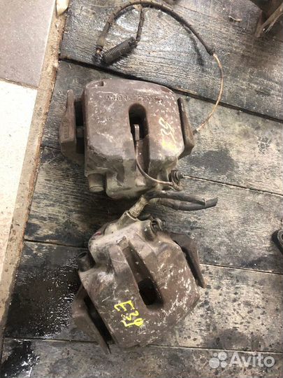 Суппорт тормозной передний BMW E39 2-2.8л