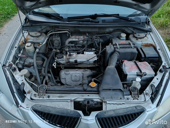 Mitsubishi Lancer 1.3 МТ, 2003, битый, 313 000 км