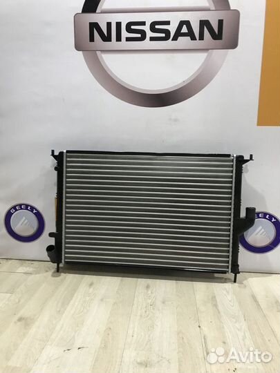 Радиатор охлаждения двигателя основной Nissan alme