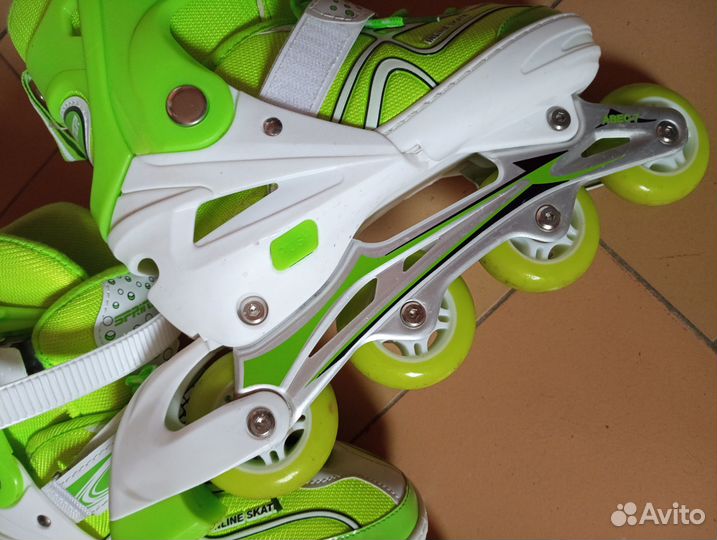 Роликовые коньки