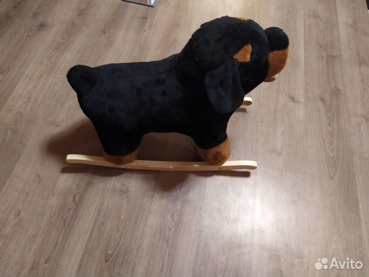 Собака качалка