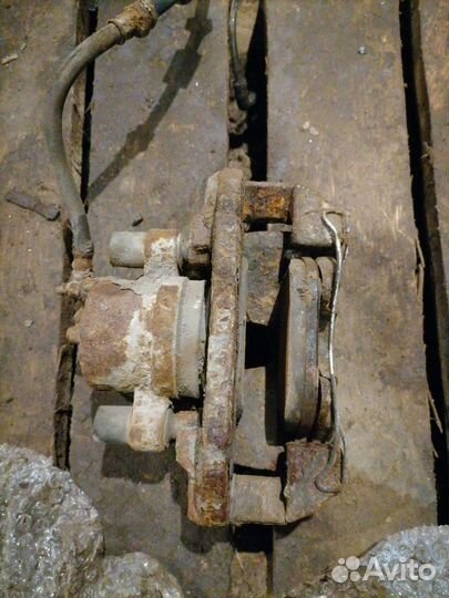 Суппорт тормозной передний правый Mazda 3