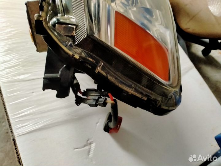 Фара левая lancer 10