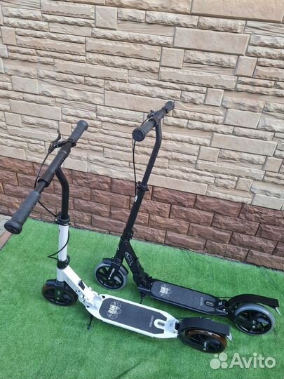 Самокат с дисковым тормозом