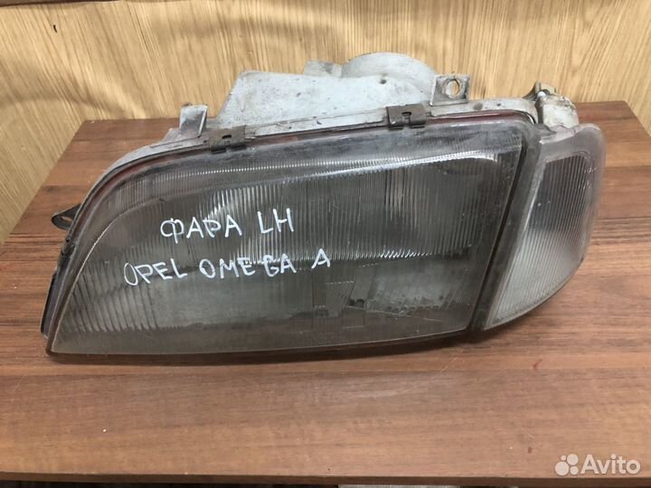 Фара левая Опель Омега А Opel Omega A