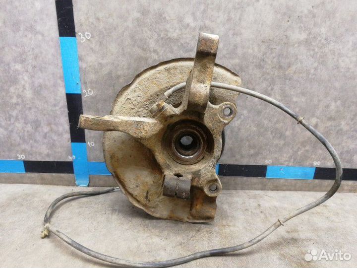 Кулак поворотный передний левый Mitsubishi Lancer