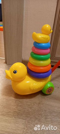 Развивающие игрушки каталка утка