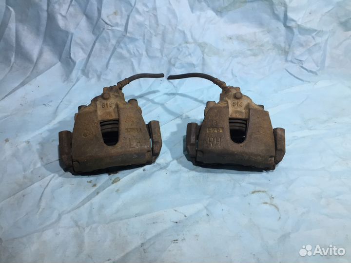 Суппорт передний правый левый Mazda 3 BL BK