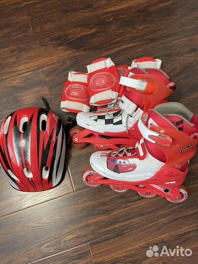 Роликовые коньки