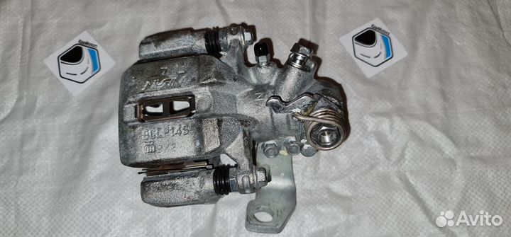 Суппорт тормозной задний левый Honda Civic 4D