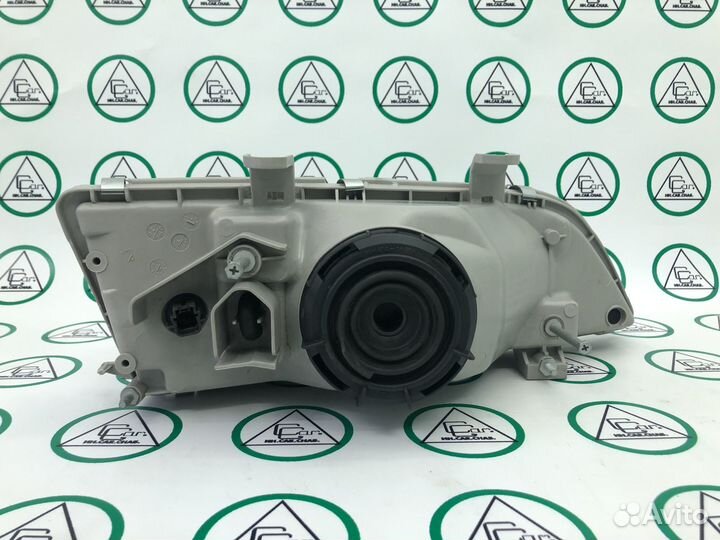 Фара основная левая для Nissan Primera II P11