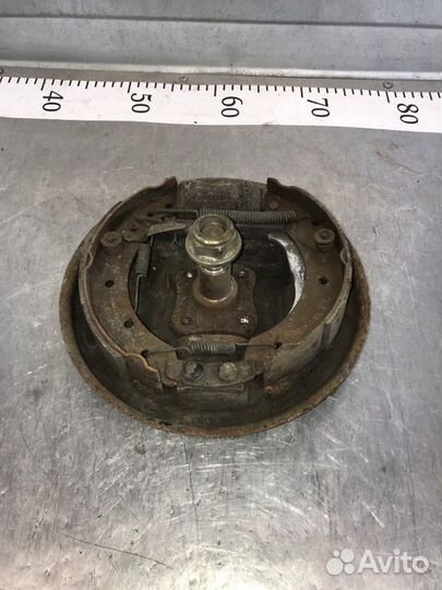 Щиток тормозной задний левый Renault Logan LS