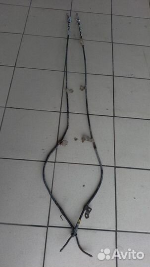 Тросик ручника Geely MK