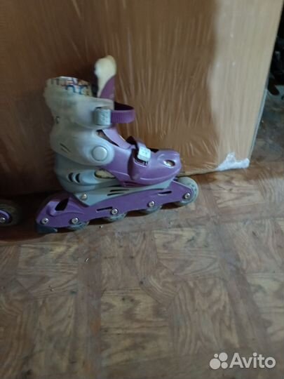 Роликовые коньки