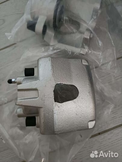 Суппорт тормозной Додж караван 3,3