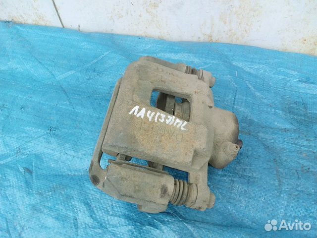 Передний левый тормозной суппорт Chevrolet Lacetti