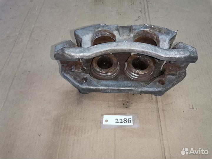 Суппорт передний левый