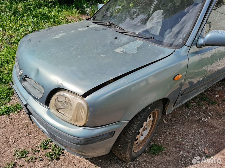 На nissan march k11