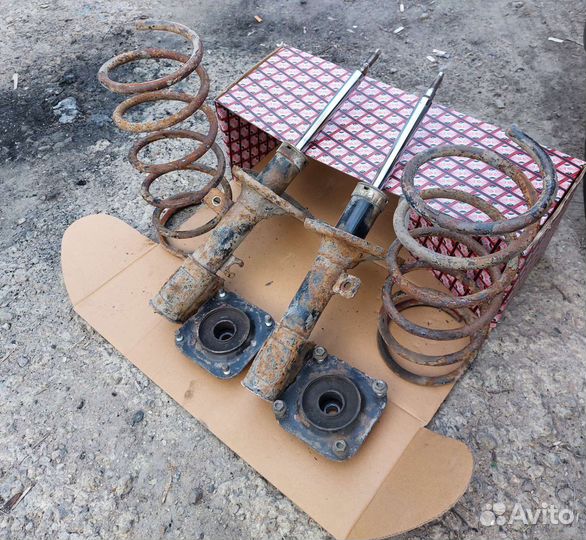 Амортизаторы передние Kia Spectra