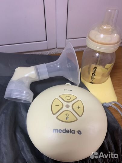 Молокоотсос medela электрический
