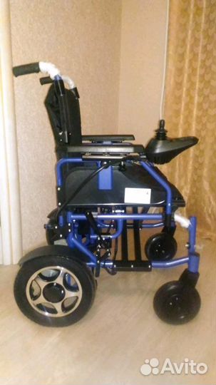 Электрическая кресло-коляска