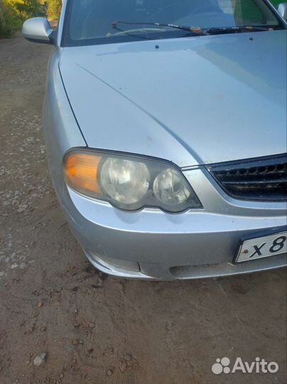 Передний фары на kia shuma 2