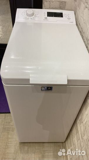 Стиральная машина с вертикальной загрузкой