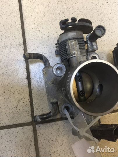 Дросельная заслонка Kia Picanto 1