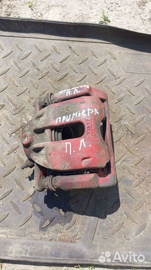 Суппорт передний nissan primera p11