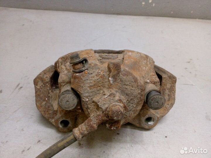 Суппорт передний левый Opel Astra H 2011