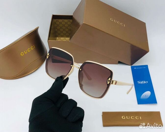 Солнцезащитные очки Gucci