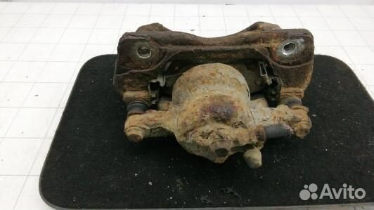 Суппорт тормозной передний правый toyota auris E15